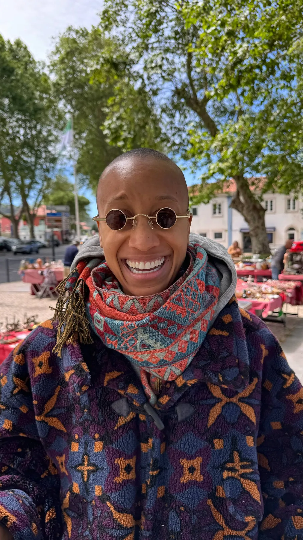 Diara smiling at a colorful outdoor market